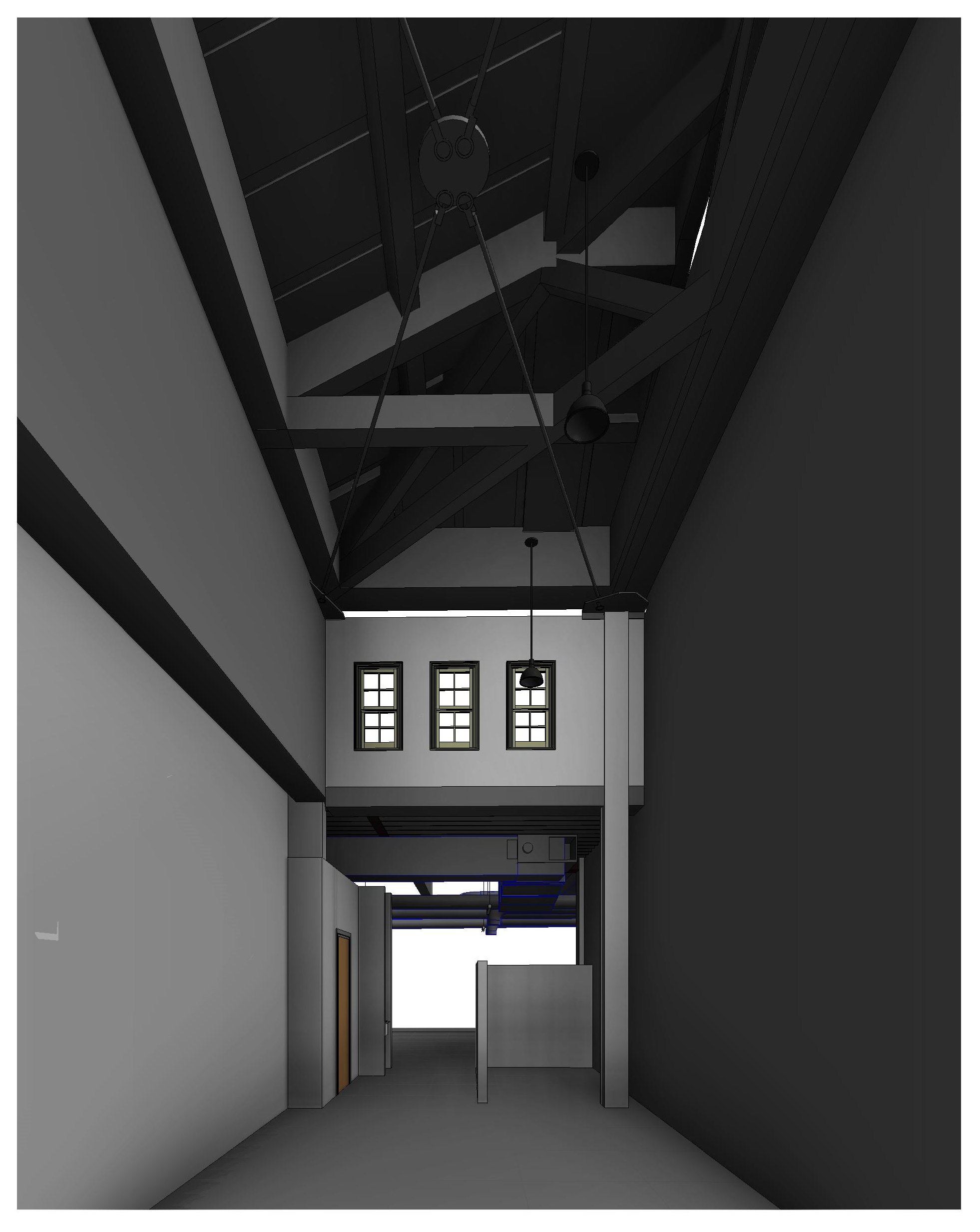 A tall interior space with exposed timber roof trusses and tie rods, looking toward windows set above a lower floor level.
